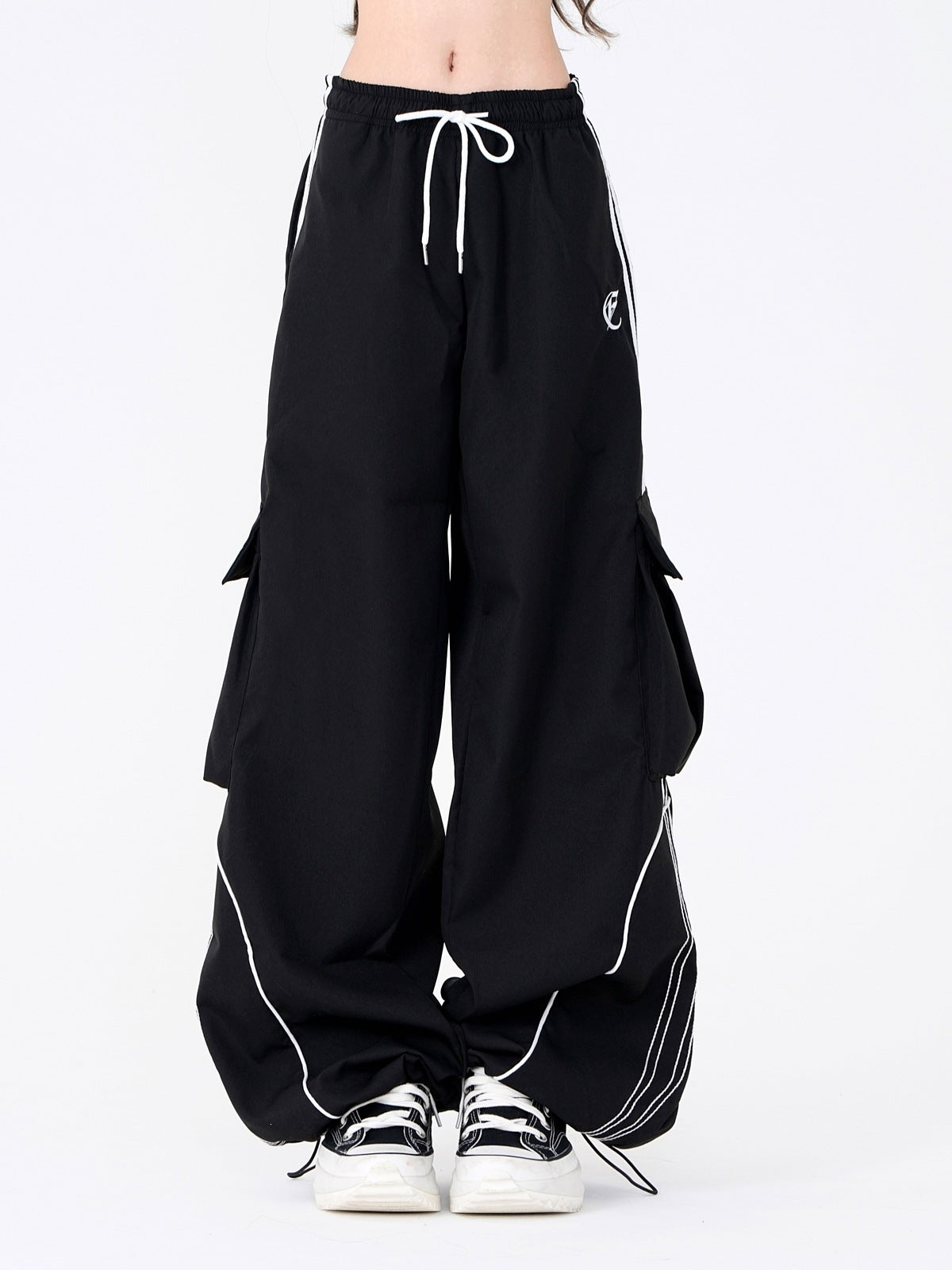 Wide leg cargo joggers - navy close-up view with drawstring waist and side stripes