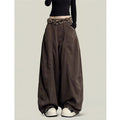 Women's coffee brown wide-leg trousers with buckle waist, close-up front view