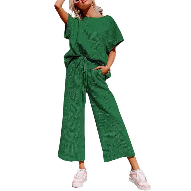 Casual two-piece set in green - women's oversized top and wide-leg pants outfit on model