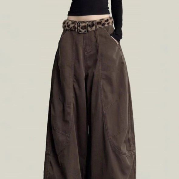 Women's coffee brown wide-leg trousers with buckle waist, close-up front view