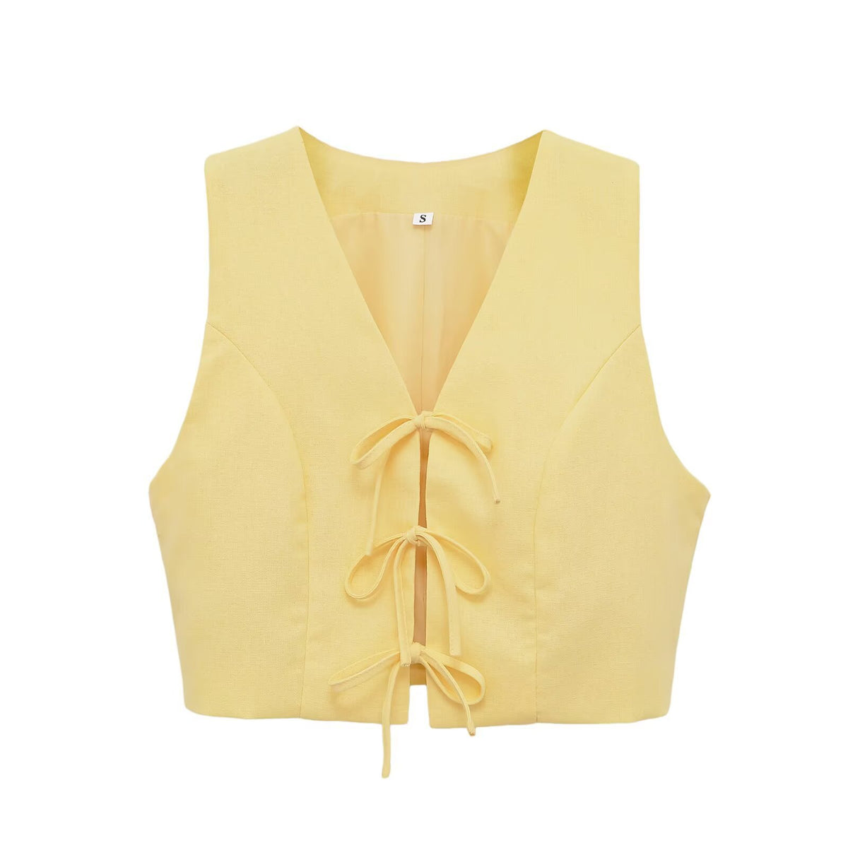 Yellow bow-tie lace-up vest with drawstring waist - flat lay view
