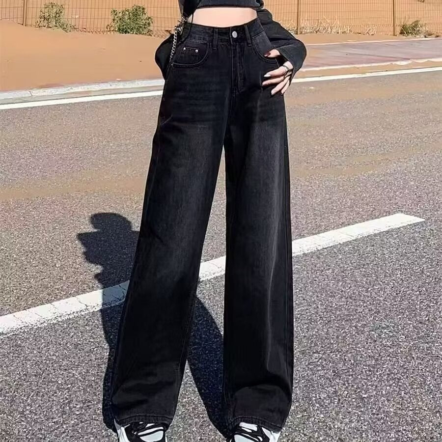 Black high-waisted wide-leg jeans - close-up front view