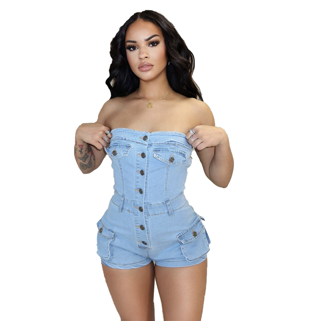 Woman wearing a light blue denim romper on a white background