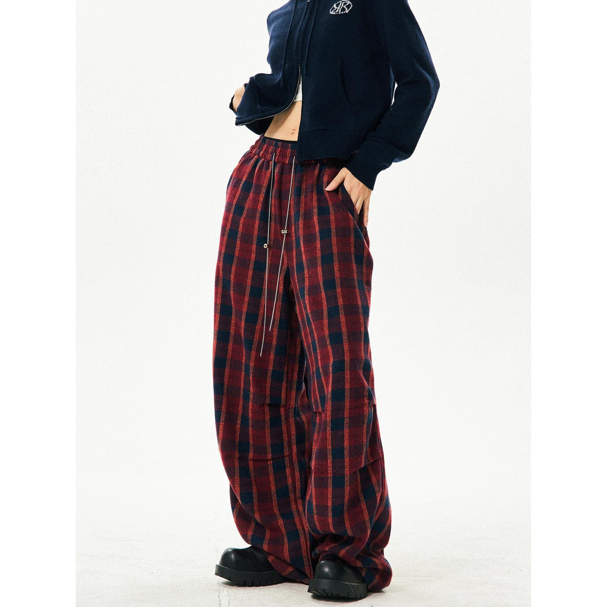 Women's retro high-waisted red plaid wide-leg pants, side angle with chain detail