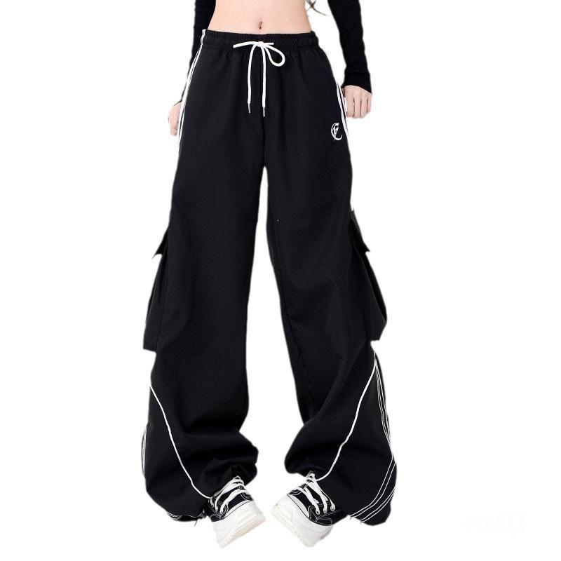 Wide leg cargo joggers - navy full length front view with sneakers