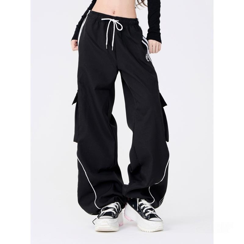 Wide leg cargo joggers - black full length front view with sneakers