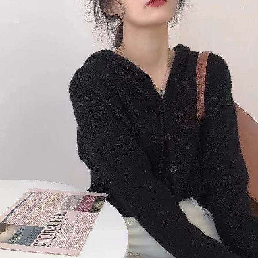 Oversized hooded knit sweater in black - women's cozy cardigan style, side view